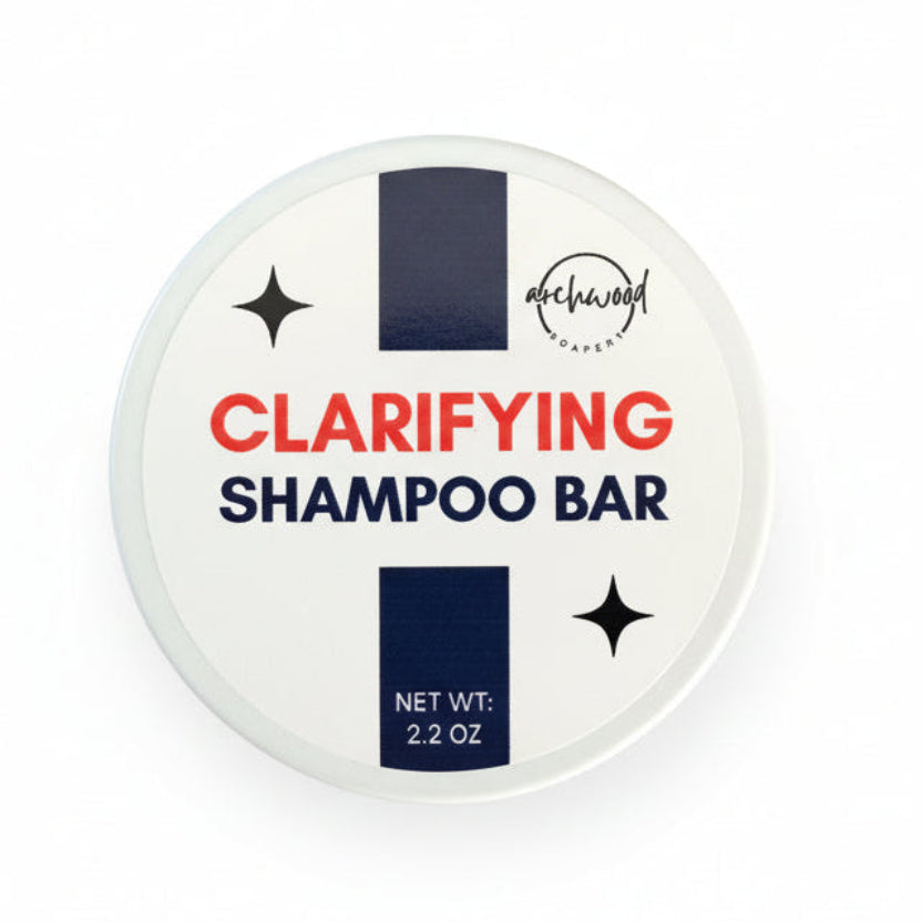 Clarifying shampoo bar packaging with brand logo on a white background