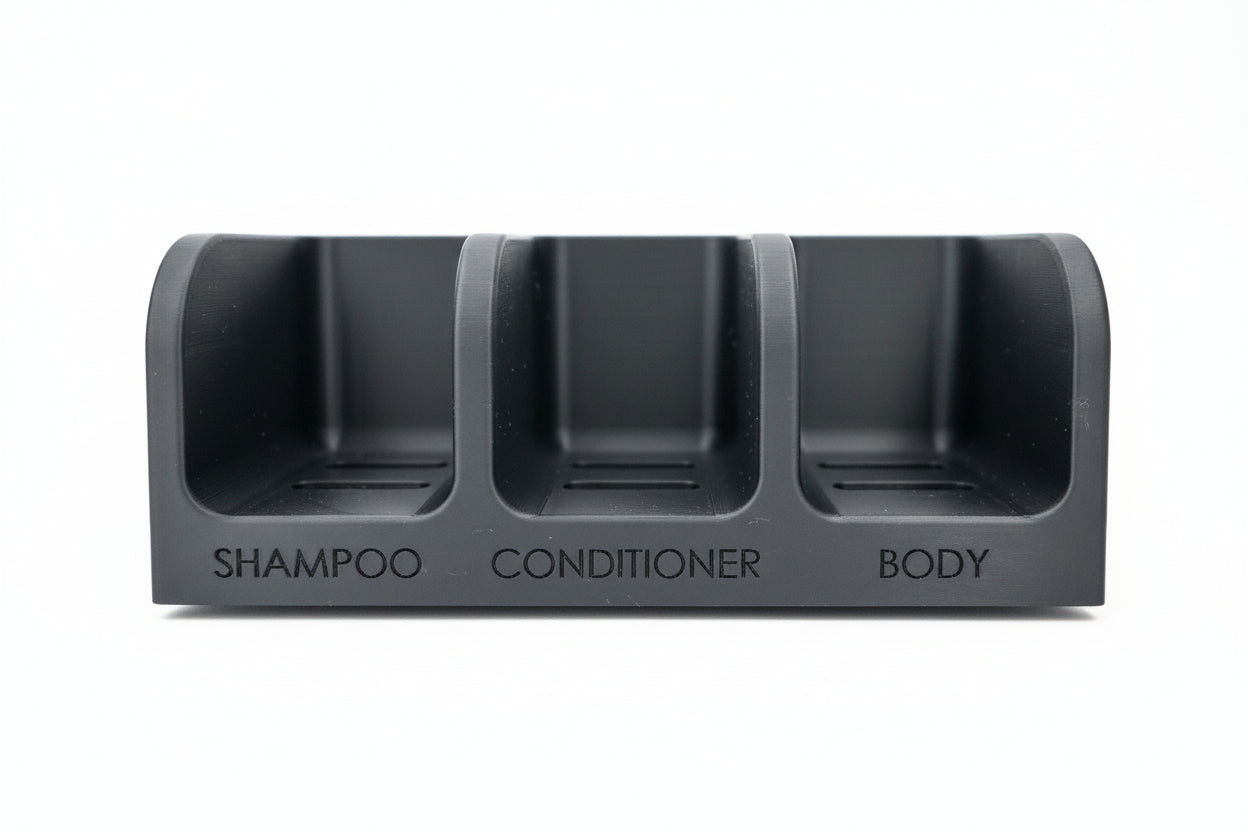 Gray three-compartment holder labeled 'Shampoo', 'Conditioner', and 'Body' on a white background