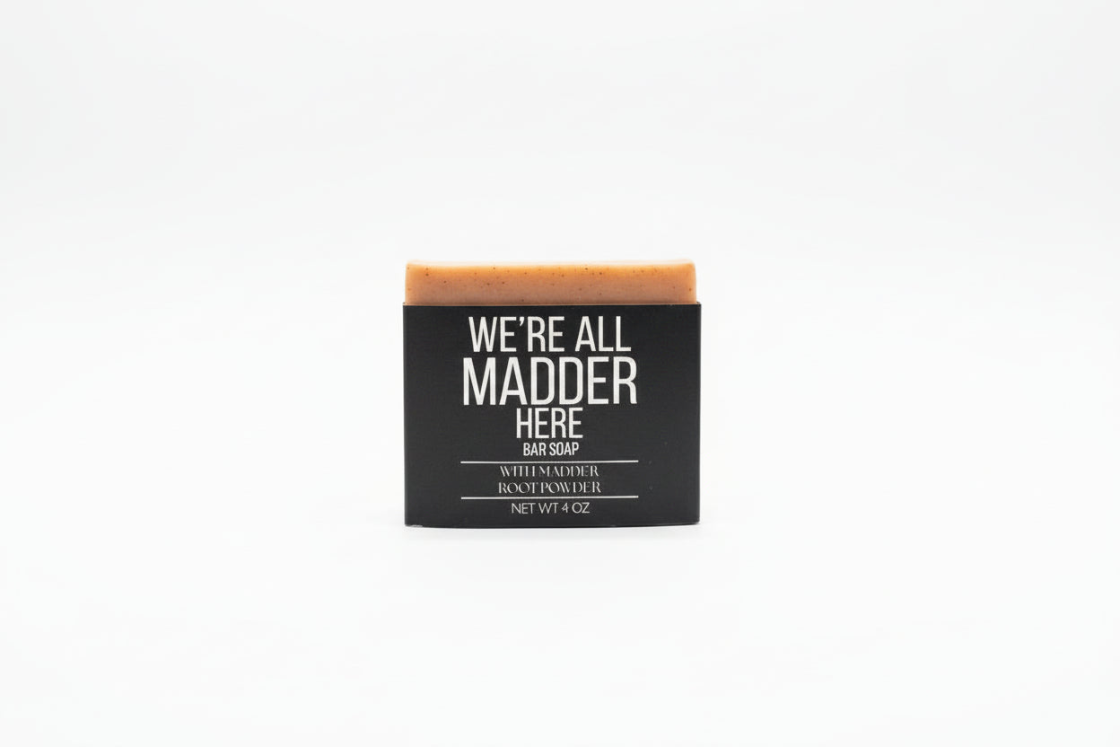 Bar of soap with a black label on a white background