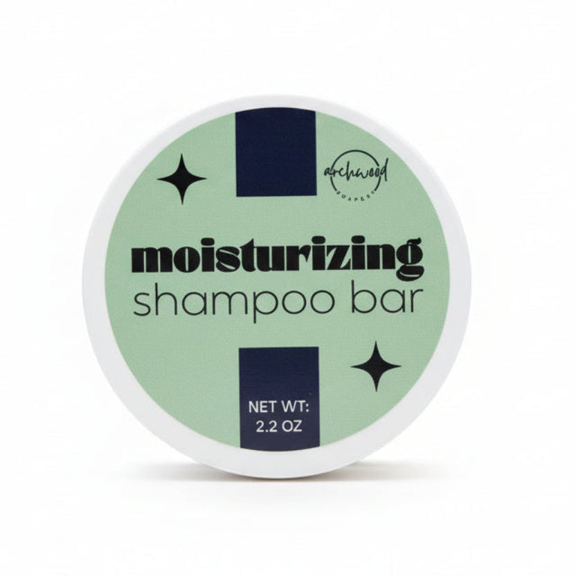 Moisturizing shampoo bar container with green label and white border on a white background