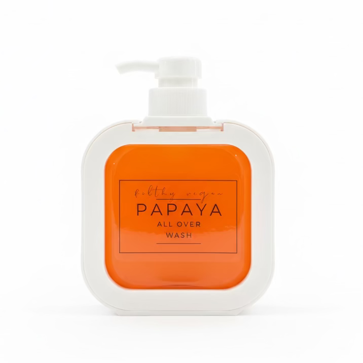 Orange bottle of Papaya all over wash with pump on a white background