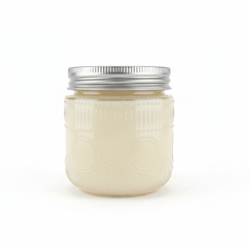 White jar with silver lid on a white background